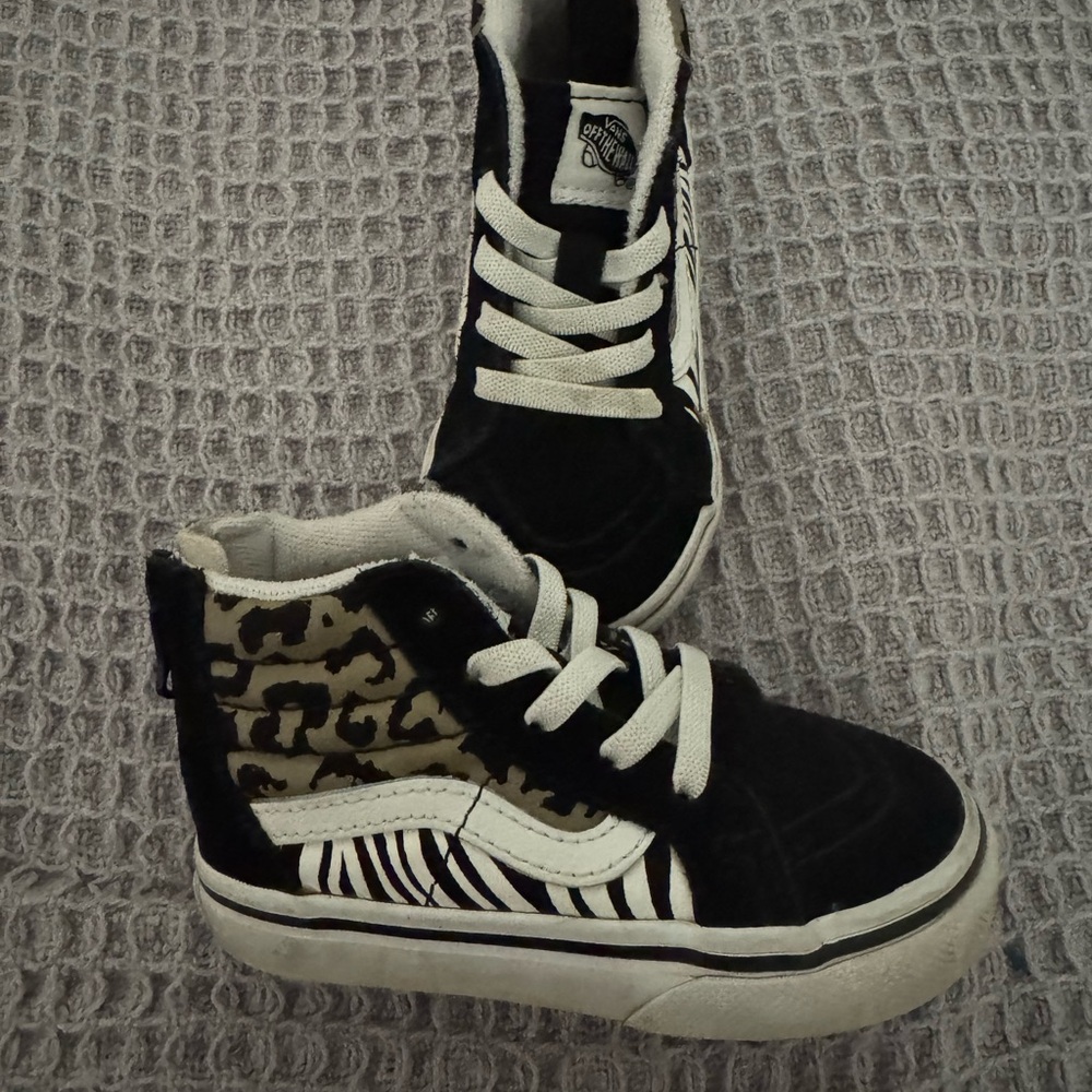 Vans Black and White High-Top Sneakers with Classic Design